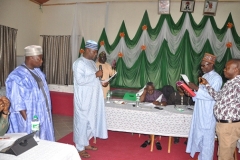 SWEARING-IN OF THE NEW SURVEYOR-GENERAL OF GOMBE STATE, SURV. ZAKARI DIFA INTO THE COUNCIL BY SURCON LEGAL ADVISER DURING THE 2019 COUNCIL RETREAT IN YANKARI GAME RESERVE, BAUCHI